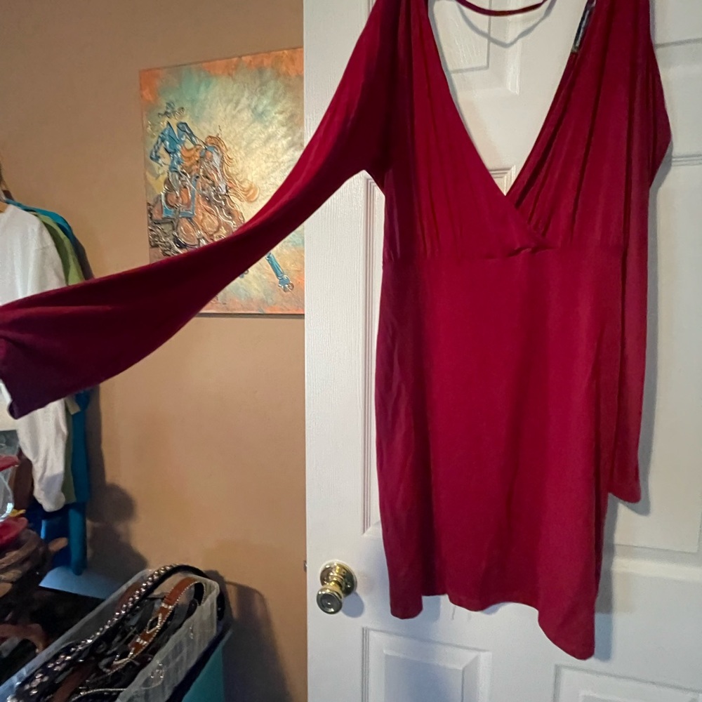 Dress, low cut front and back.